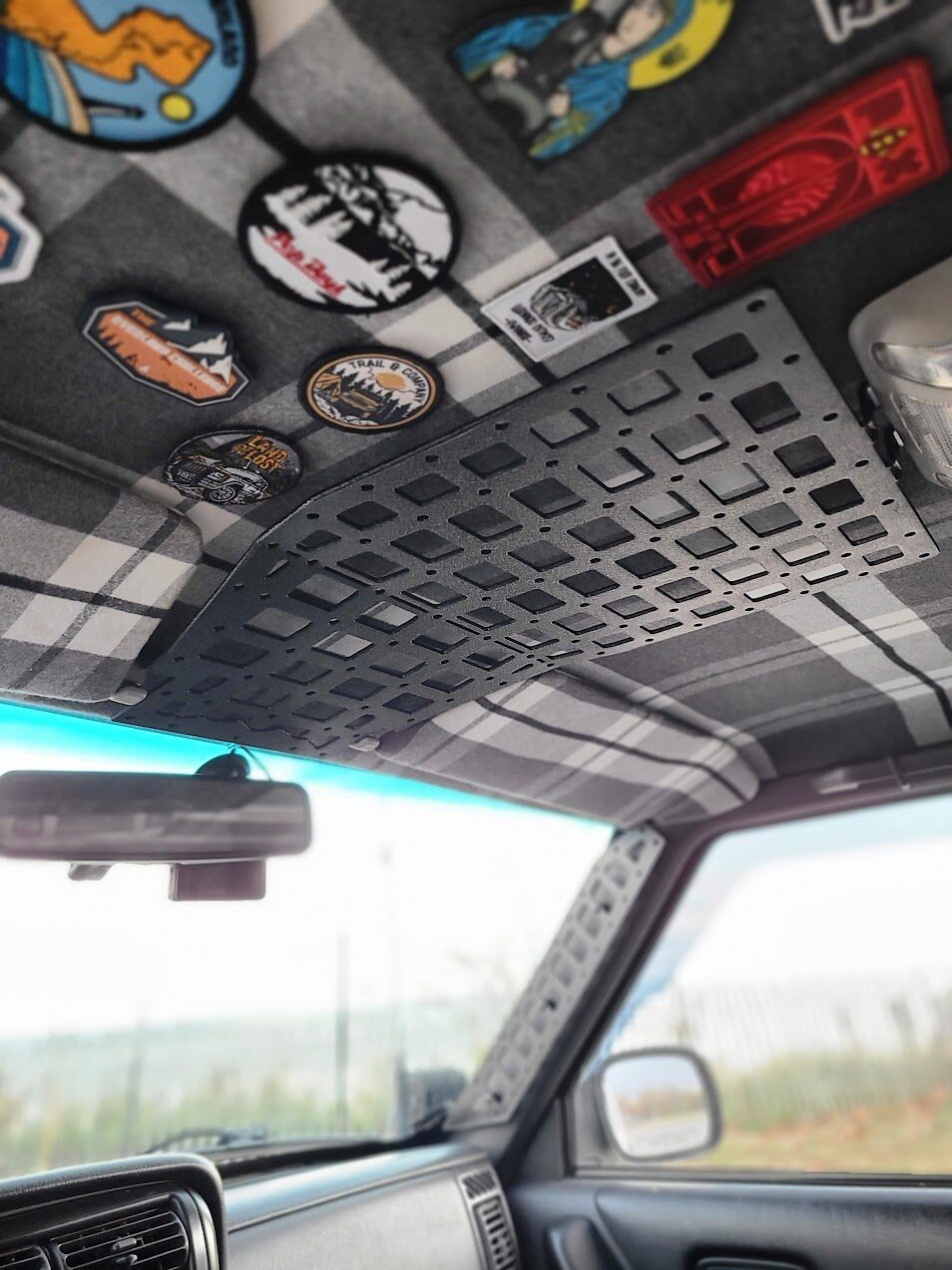 Jeep XJ molle panel installed as overhead console for overland storage